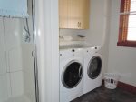 Laundry Room with Washer and Dryer and Shower